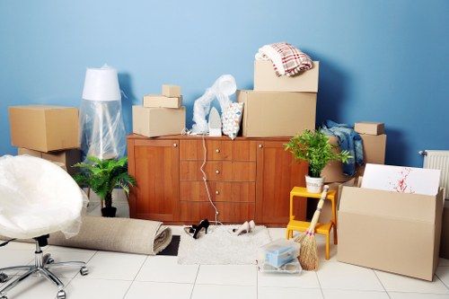 Local Enfieldhighway removals team transporting boxed items
