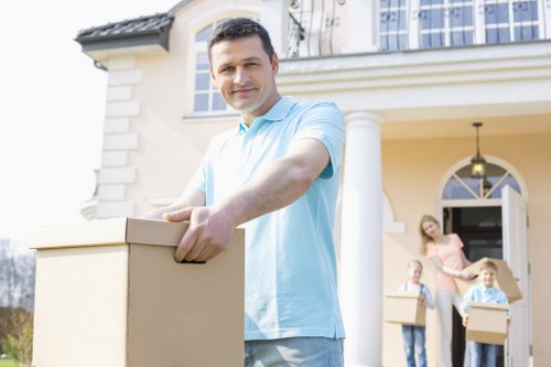 Moving team unloading furniture at a property in Enfield Highway