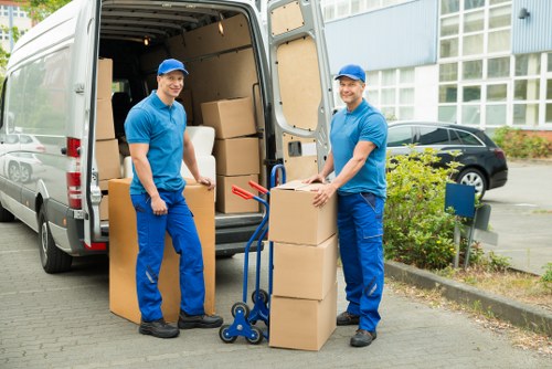 Packed boxes and furniture in a secure storage unit