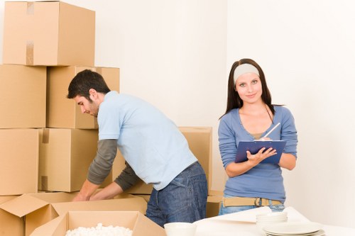 Furniture being dismantled before house removals in Enfieldhighway